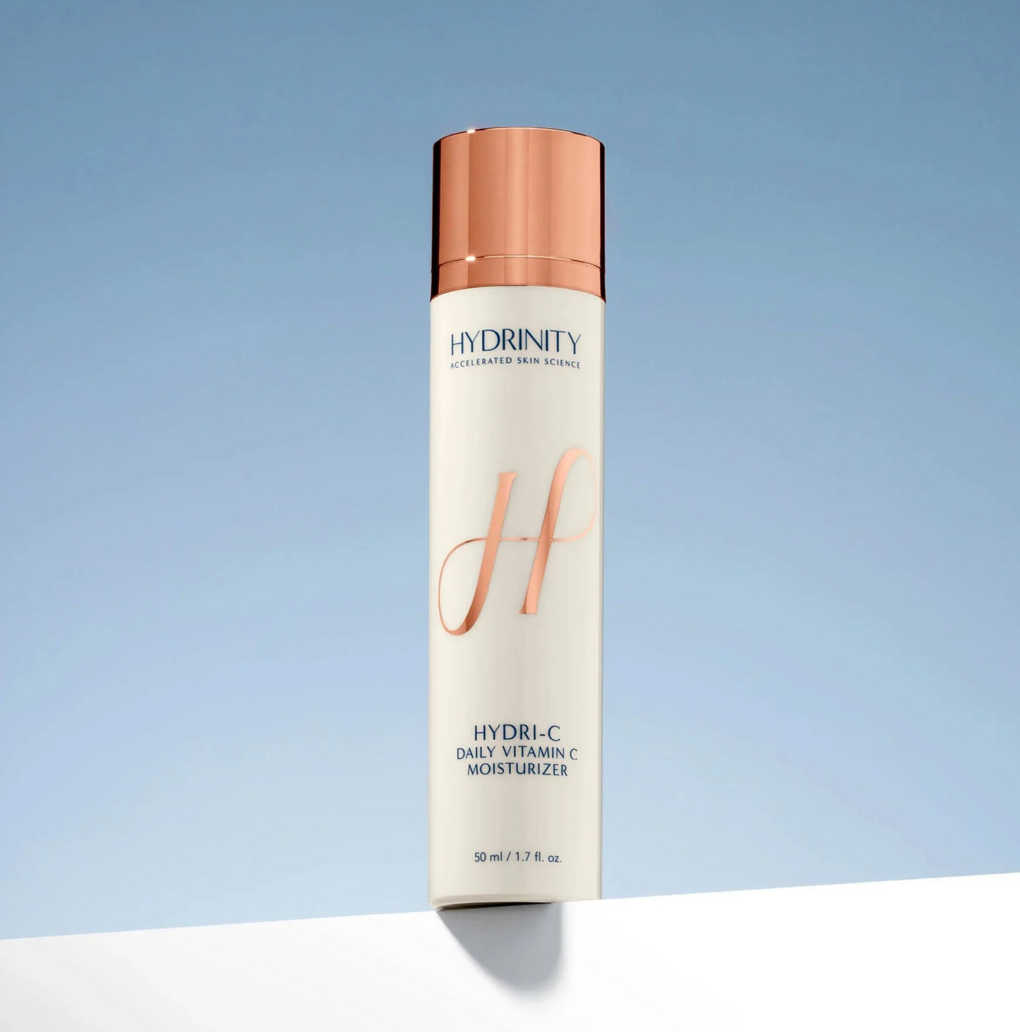 Hydrinity skincare product on a gradient blue background