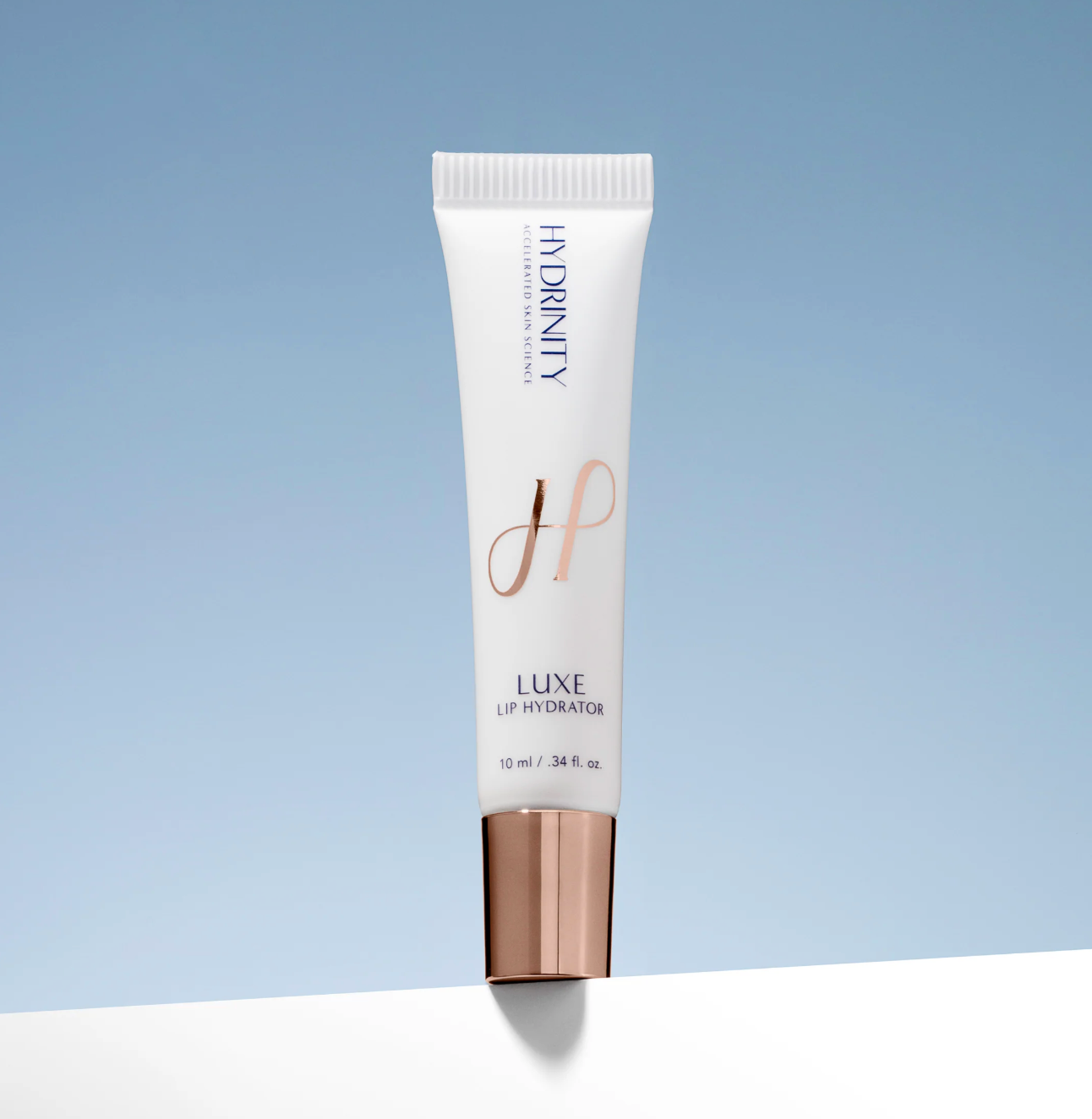 Lip hydrator tube with 'Eridinity' branding on a gradient blue background