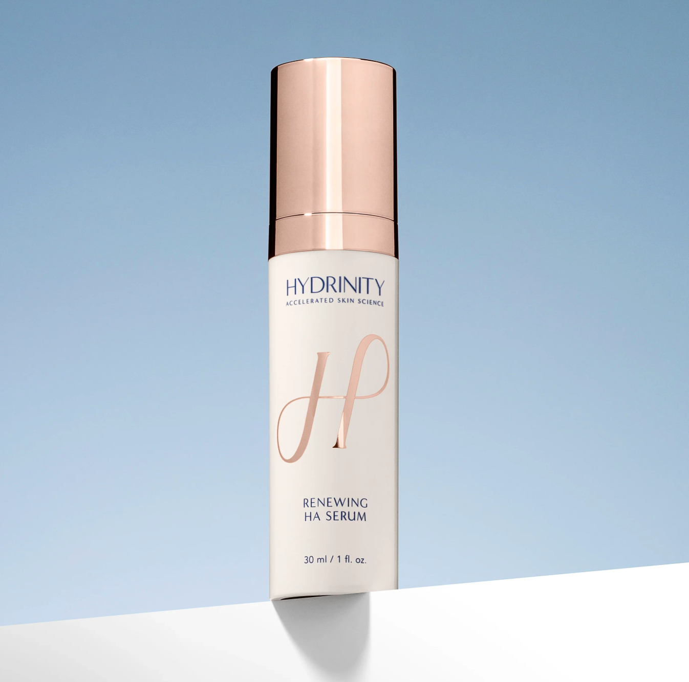 Hydrinity Renewing HA Serum bottle on a light blue background