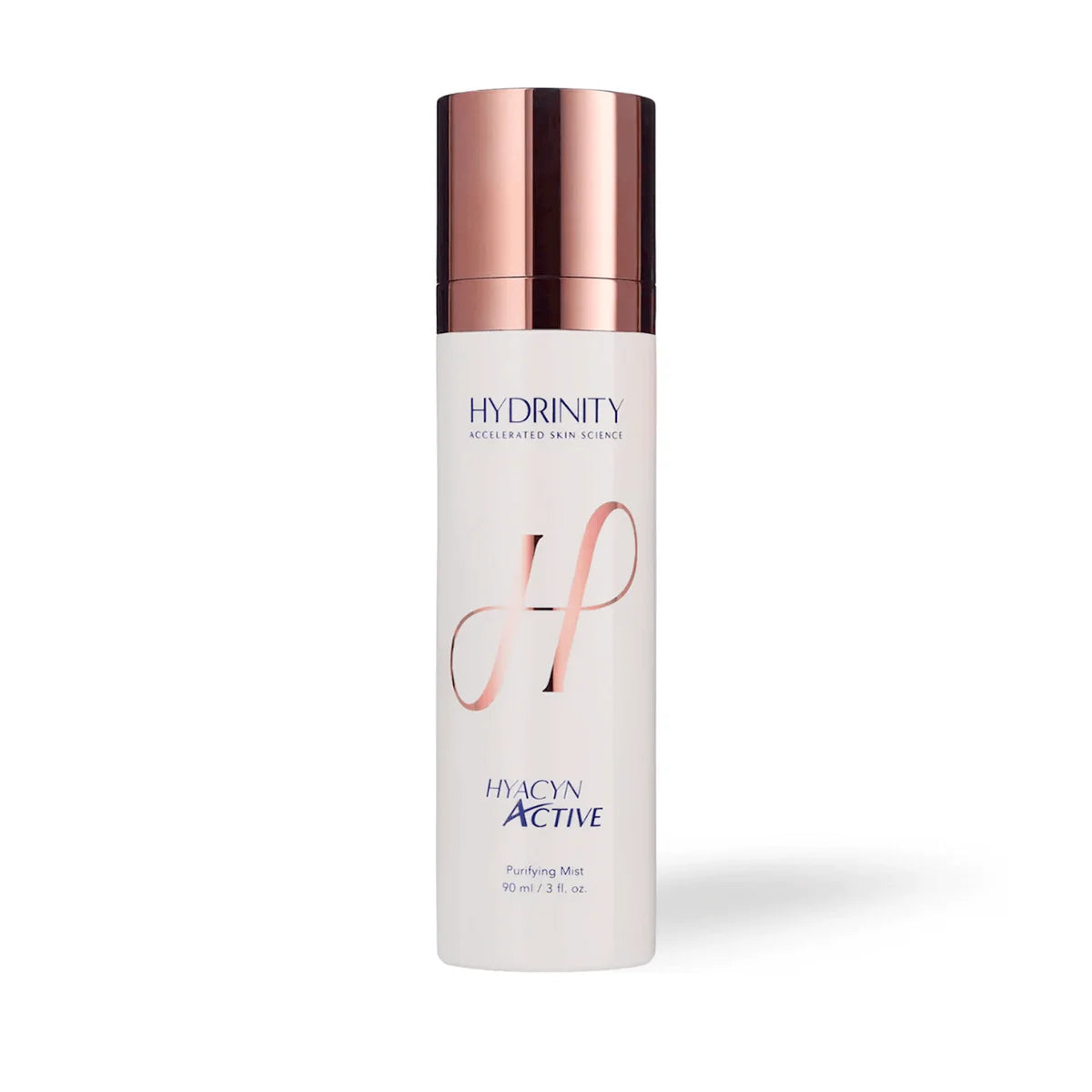 Skincare bottle with rose gold cap and branding on a white background
